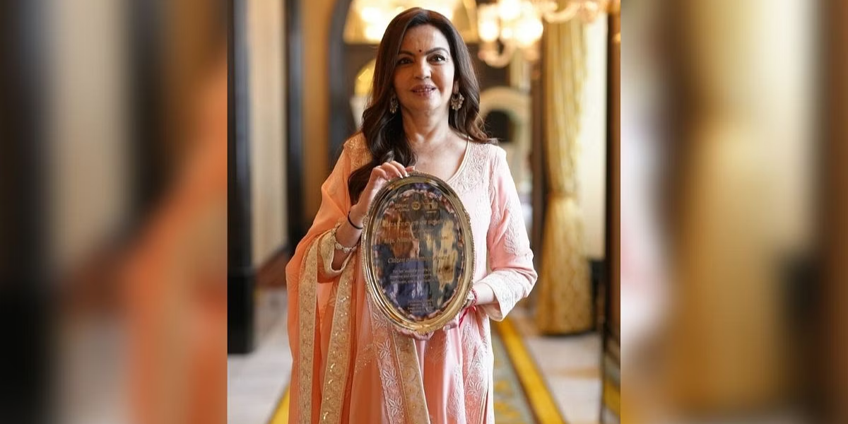 Nita ambani with award