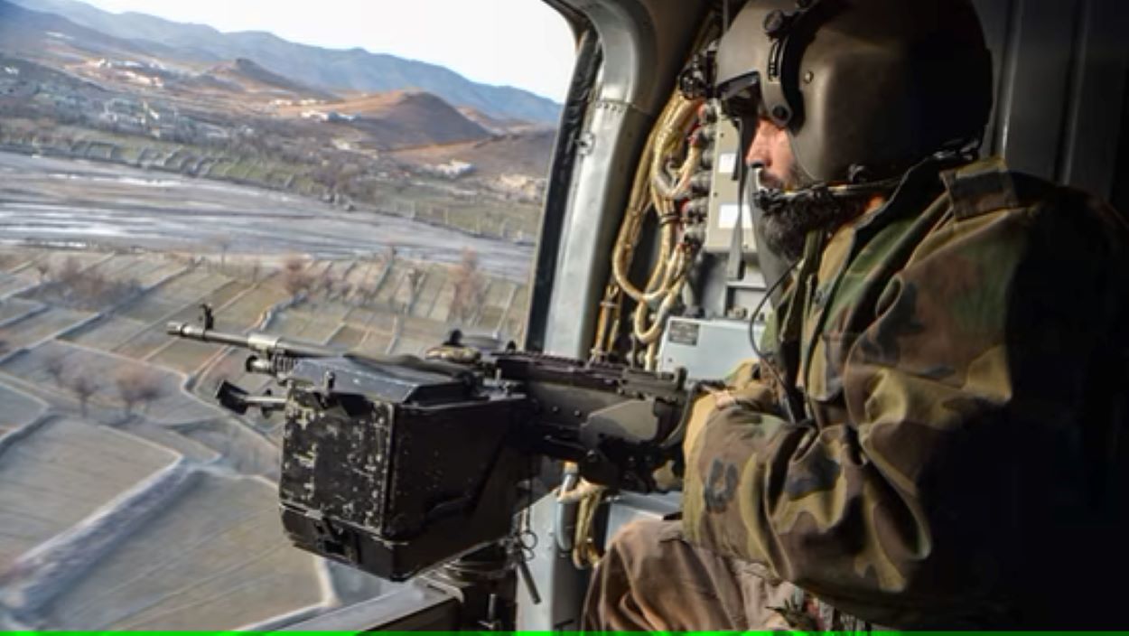 A Taliban security personnel keeps watch