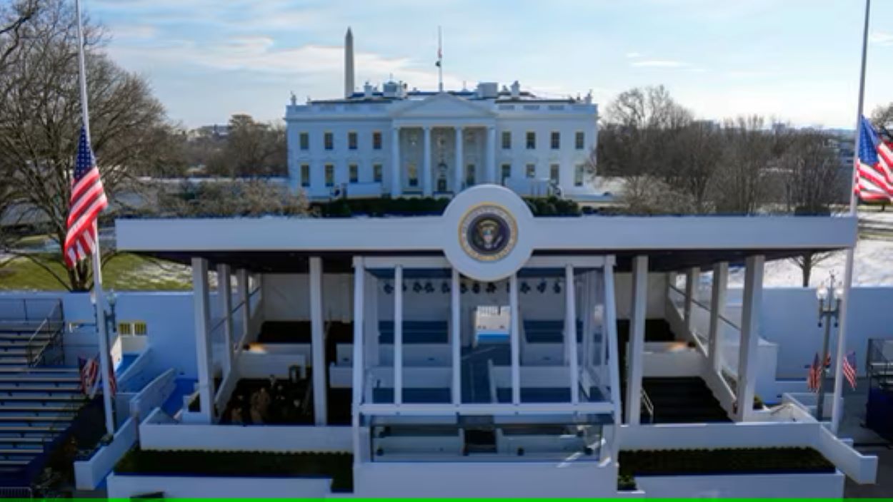 Workers continue with the finishing touches on White House